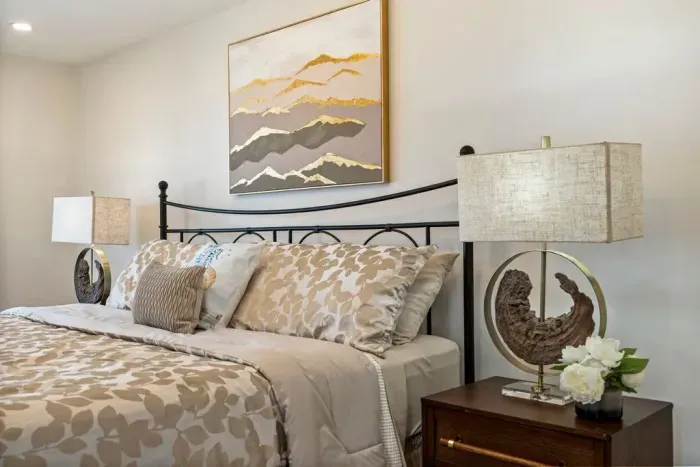Master bedroom with king size bed and private deck featuring ocean views. Large closet and dresser available for storage.