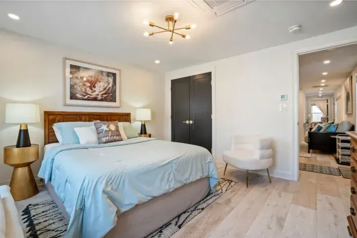 Bedroom #1 has a queen sized bed, full sized closet, and large dresser for storage. Cleaning linens provided