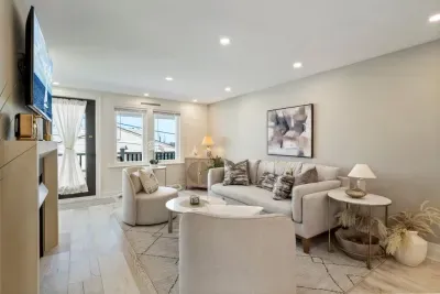 Open concept and modern living area with smart TV and gas fireplace