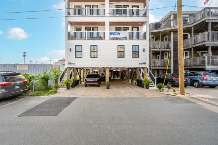 The condo is located on the right side. 2-3 vehicles (depending on size) can be parked underneath the condo.