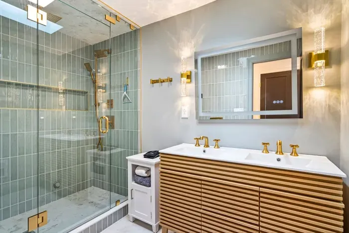 Beautiful master bedroom ensuite bathroom with standing tile shower. Shower also has a steam setting.