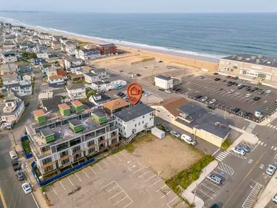 Aerial view of the building. The condo is a very short walk from Salisbury center and beach!