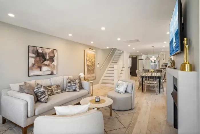 Open concept and modern living area with smart TV and gas fireplace