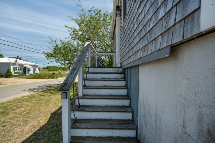 Stairs up to the front door