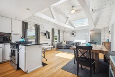 Open concept kitchen, dining area, and living room