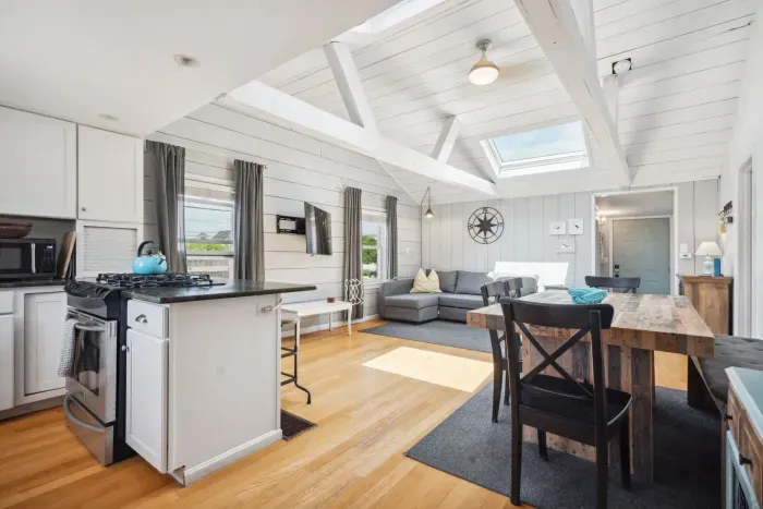 Open concept kitchen, dining area, and living room