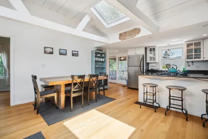 Open concept kitchen, dining area, and living room