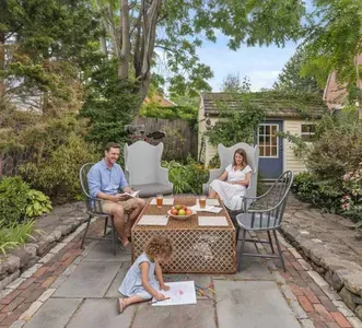 Spend quality time with your family in a private & peaceful garden area that comes with a detached bunk house with 1 twin bed, and deck attached to main house with gas grill.