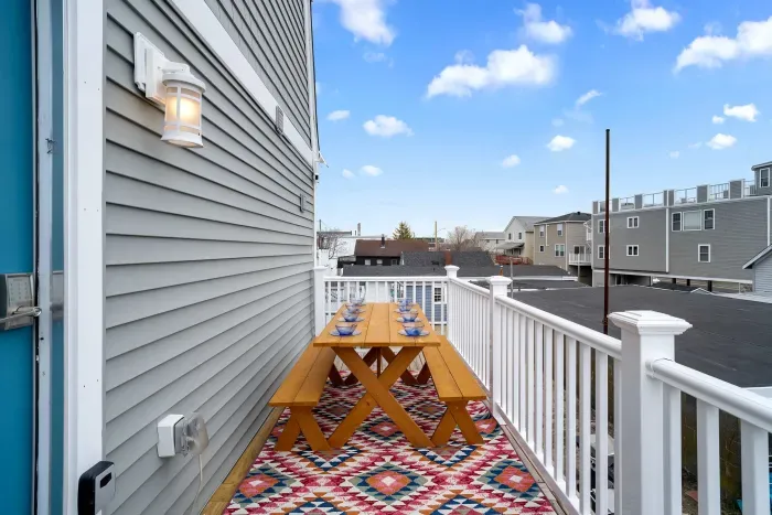 Private back deck, with picnic table to accommodate 6 people.