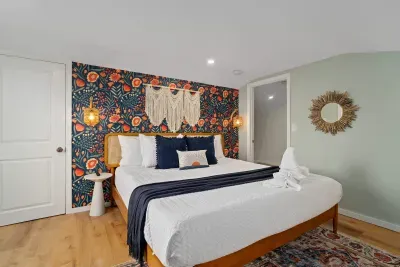 Bedroom #3 (3rd floor) with king bed, flat smart TV, work-from-home desk and balcony facing the ocean.