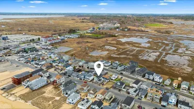Arial photo of our property, 1 block to the nearest public beach access and 3 blocks to the Salisbury Center.