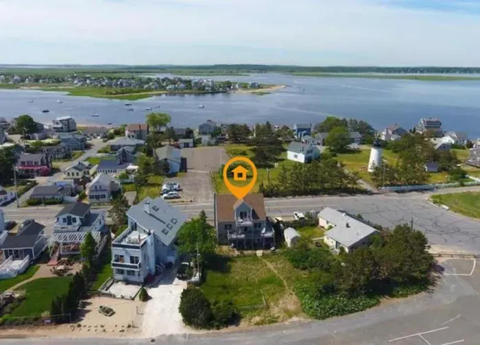 This home is perfectly located on Plum Island -- just steps away from the boardwalk, beach, basin, river and Plum Island lighthouse.