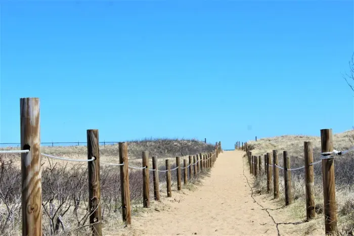 Easy public access to and from the beach, just steps away from the rental.