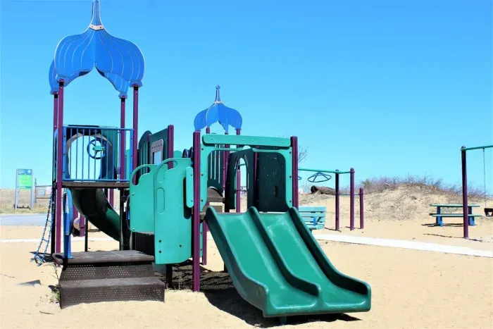 This children's playground is located right outside the back entrance of the rental.