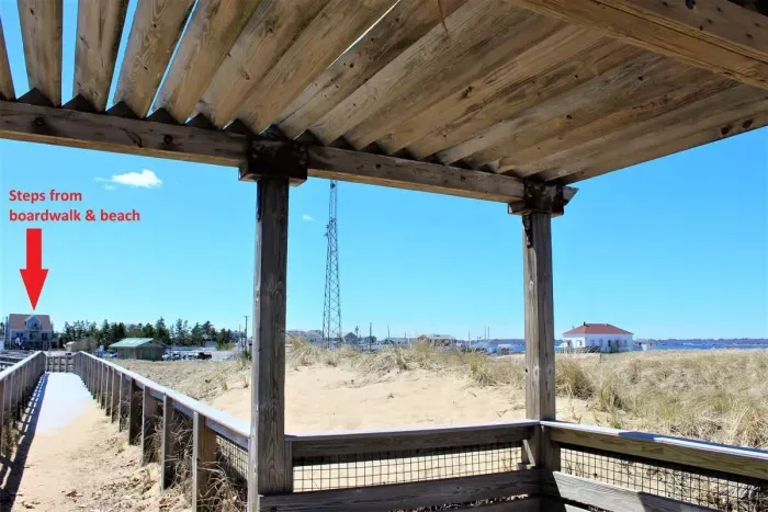 This home is perfectly located on Plum Island -- just steps away from the boardwalk, beach, basin, river and Plum Island lighthouse.