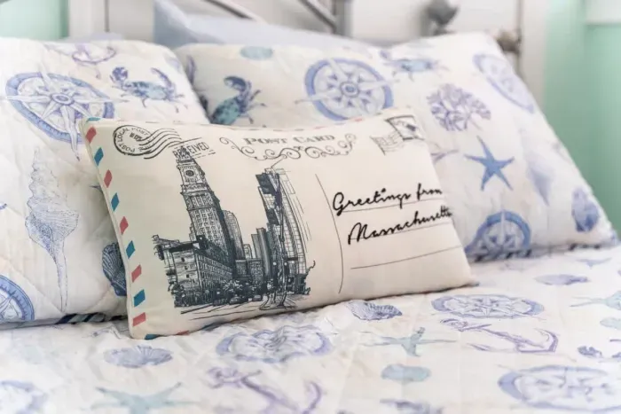 Second of three bedrooms, full-sized bed, beautiful natural light, plenty of closet space and storage.