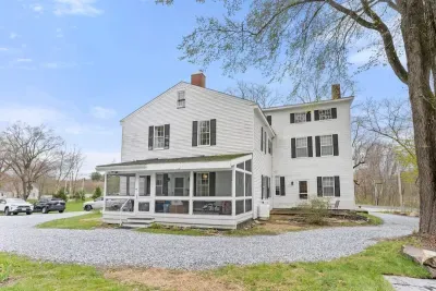 Front entrance of the apartment is accessed though the 3 seasons porch