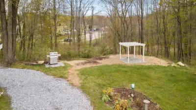 pergola & grill on the front yard