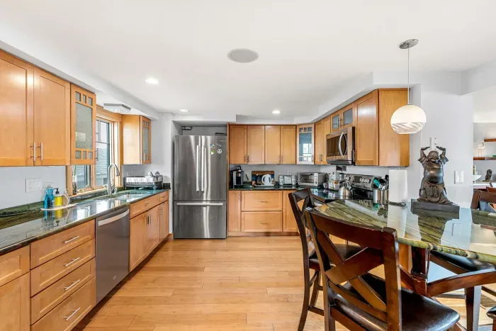 Fully equipped and updated kitchen with all the essentials including a dishwasher. Stunning italian countertops throughout the kitchen. Perfect for prepping those big meals!
