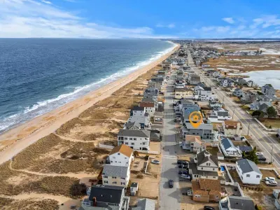 Aerial view of the home! The beach access is right across the street from the property!