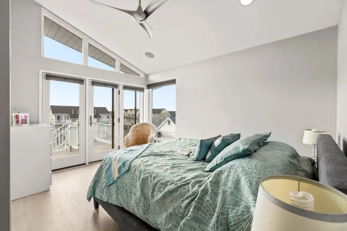 The second bedroom in the penthouse with a queen bed and clean provided linens