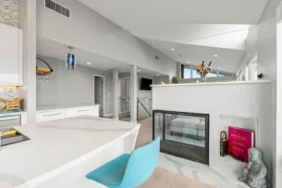 Vaulted ceilings and the gas fireplace up here create an incredible ambiance.