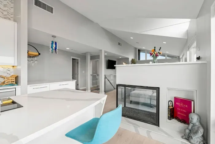 Vaulted ceilings and the gas fireplace up here create an incredible ambiance. 
