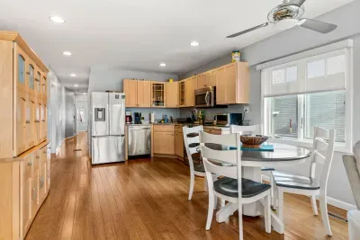 Fully equipped and updated kitchen in the Nautical unit with a dishwasher! Seating for 4 at the table.