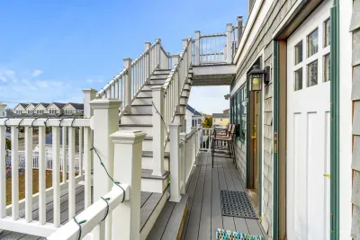 This staircase at the back of the property serves as a secondary entrance/exit for the entire property. The two doors pictured access the Yoga Retreat and the Nautical Unit