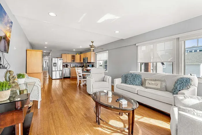 The Nautical Unit - Featuring a large living room with a comfy couch and a smart TV