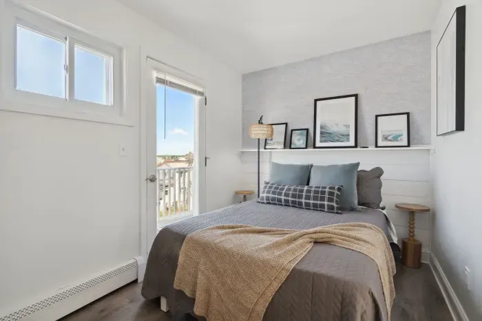 Bedroom #2 with full bed located off the kitchen