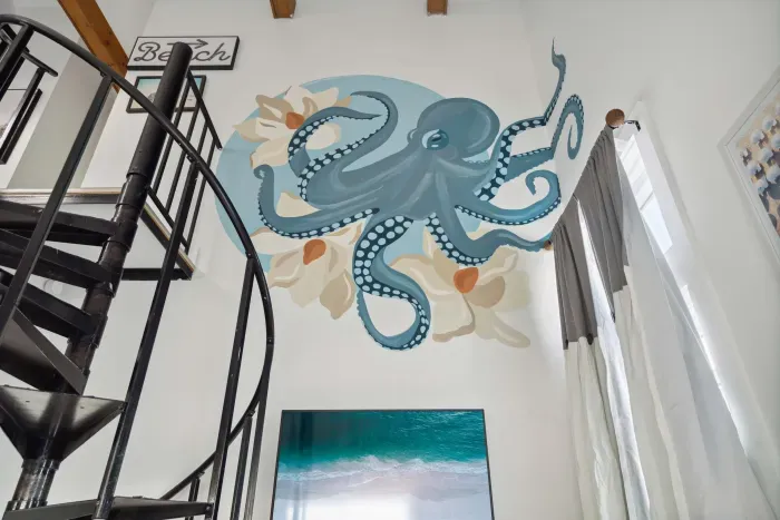 Beautiful beach themed murals throughout done by a local artist!