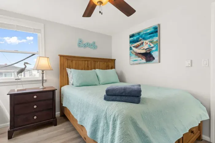 Primary bedroom with queen bed