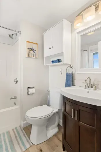 1 bathroom with shower tub combo