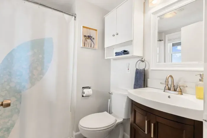 1 bathroom with shower tub combo