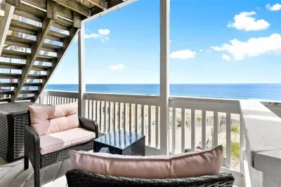 Private deck with outdoor seating, perfect for a morning coffee or afternoon drink (patio furniture not available Nov-Mar)