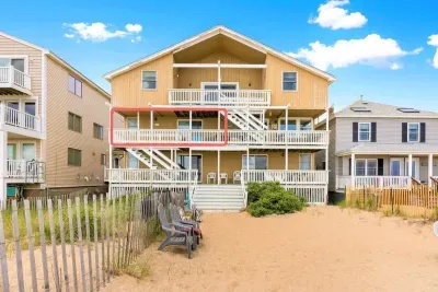 Oceanfront condo (re-sided to gray as of September 2023) with water views, condo located on 2nd level