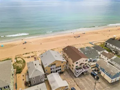 Oceanfront condo (re-sided to gray as of September 2023) with water views, condo located on 2nd level