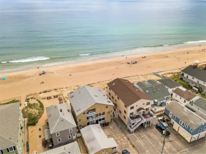 Oceanfront condo (re-sided to gray as of September 2023) with water views, condo located on 2nd level