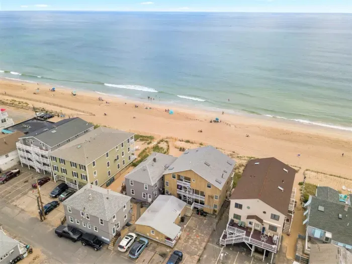 Oceanfront condo (re-sided to gray as of September 2023) with water views, condo located on 2nd level