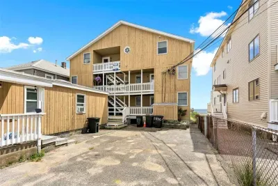Oceanfront condo (re-sided to gray as of September 2023) with water views, condo located on 2nd level