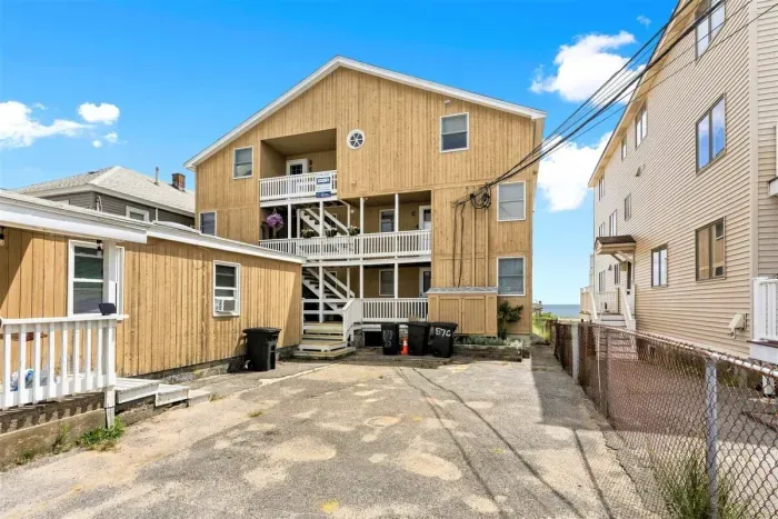 Oceanfront condo (re-sided to gray as of September 2023) with water views, condo located on 2nd level