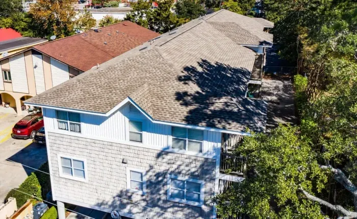 Front, street view, of the IBIS Condominiums, just a half block to the beach with covered garage parking.