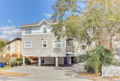 Our condominium building, with covered garage parking