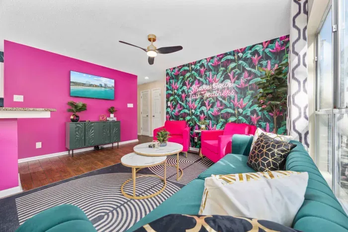 Strike a pose under the neon wall — Instagram ready!