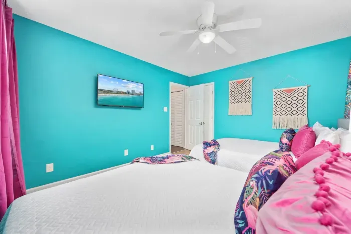 Bedroom #2 with 2 queen beds, closet and smart Roku TV