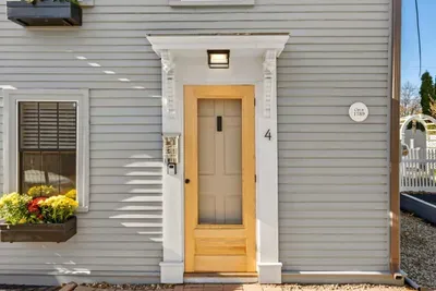 Front entrance. You have 1 off-street parking spots to the right of the property.