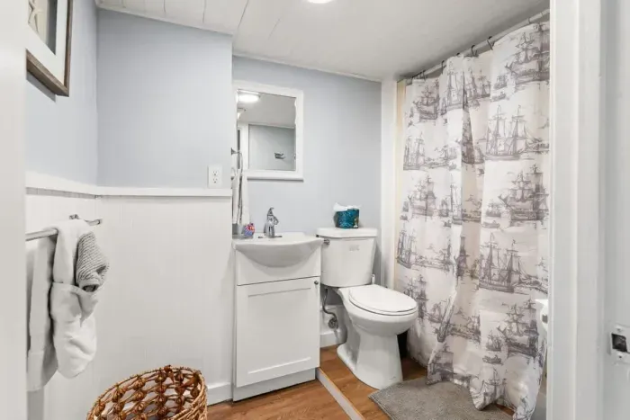 Bottom unit: Full bathroom with stand up shower.