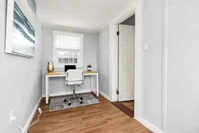Top unit: Dedicated office/"work-from-home" space in back of home.