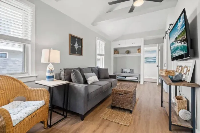 Top unit: Living room with couch (not a sleeper sofa) and smart Roku TV to enjoy your streaming services and basic cable.